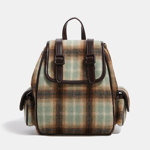Compact vintage plaid backpack in khaki and sage check with dark leather-look trim, buckle flap closure, and adjustable