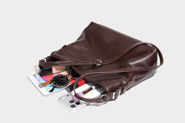 Large slouchy hobo shoulder bag in dark brown with smooth leather-look finish, adjustable strap, and silver-tone hardware