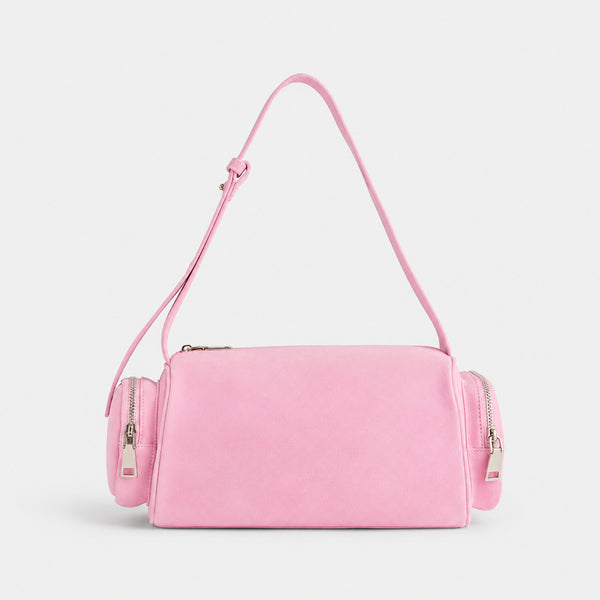 Mini barrel shoulder bag with side zip pouches and adjustable strap in pink suede-like finish, detail view 12