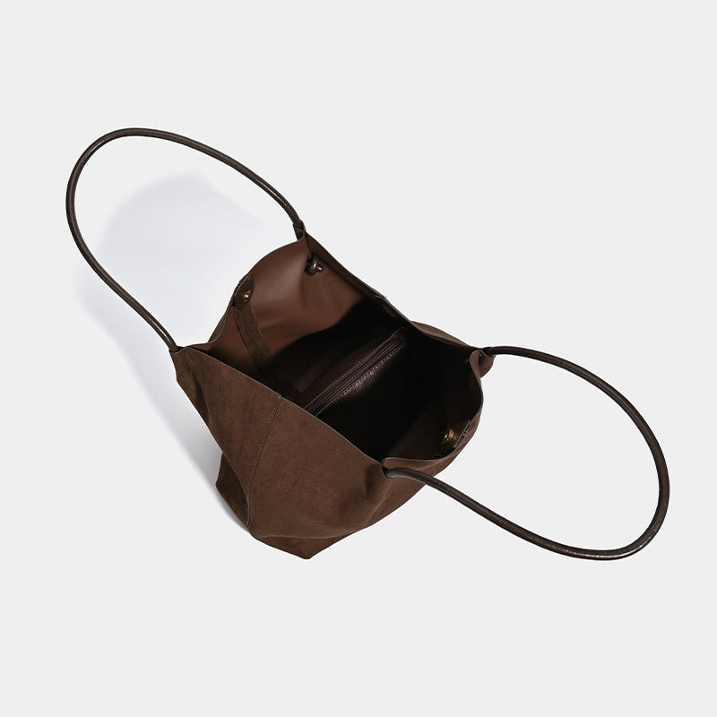 Large open-top suede-finish tote bag with slim shoulder straps in dark brown, detail view 4