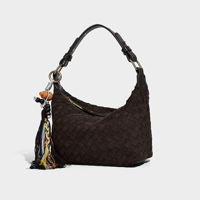 Small woven-texture crescent hobo bag in dark chocolate brown with top zip closure, gold-tone hardware, and adjustable, front