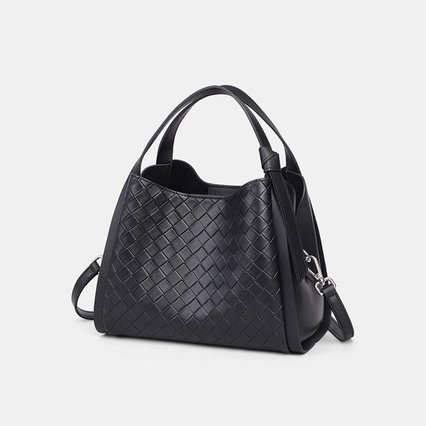 Black woven leather-look bucket tote bag with dual top handles and detachable shoulder strap, silver-tone hardware and zip