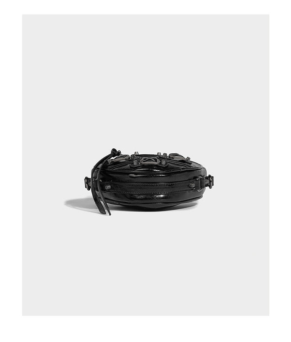 Mini heart-shaped crossbody bag with glossy crinkled finish and moto buckle hardware, detail view 13