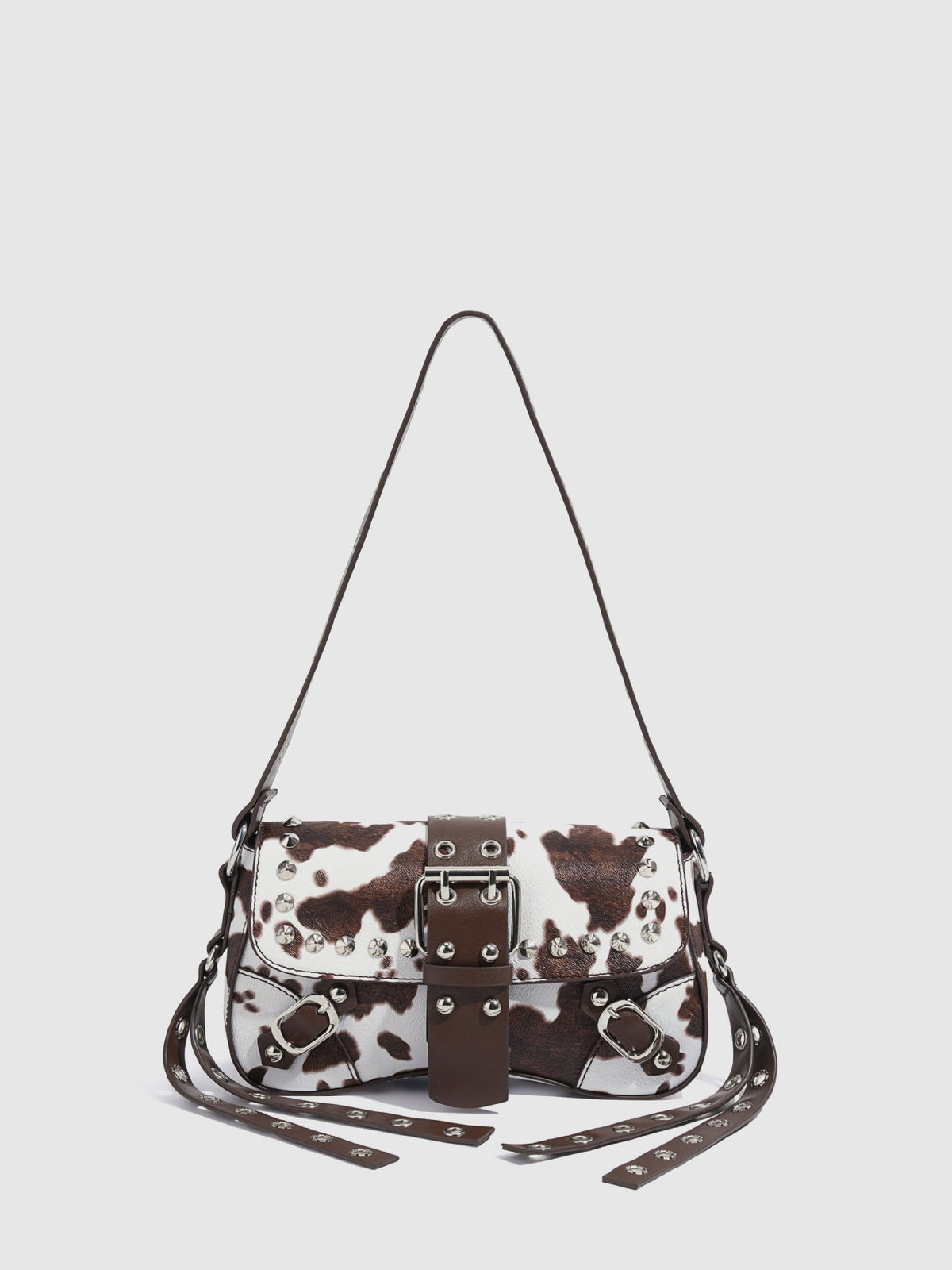 Mini square cow-print leather-look shoulder bag with metal stud hardware and dual carry straps, detail view 6