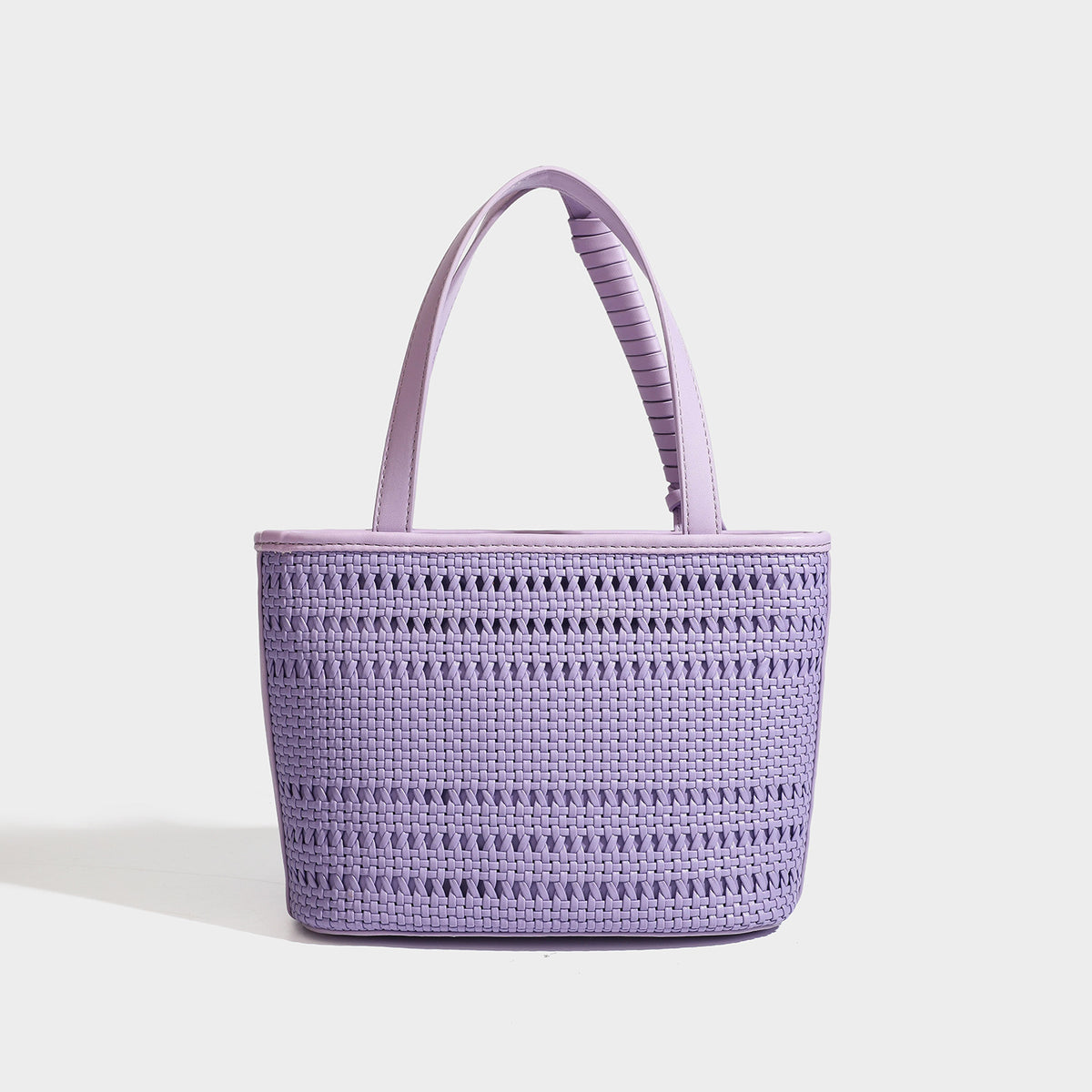 Structured open-weave tote bag with smooth leather-look trim, double top handles, detachable crossbody strap, and mini zip