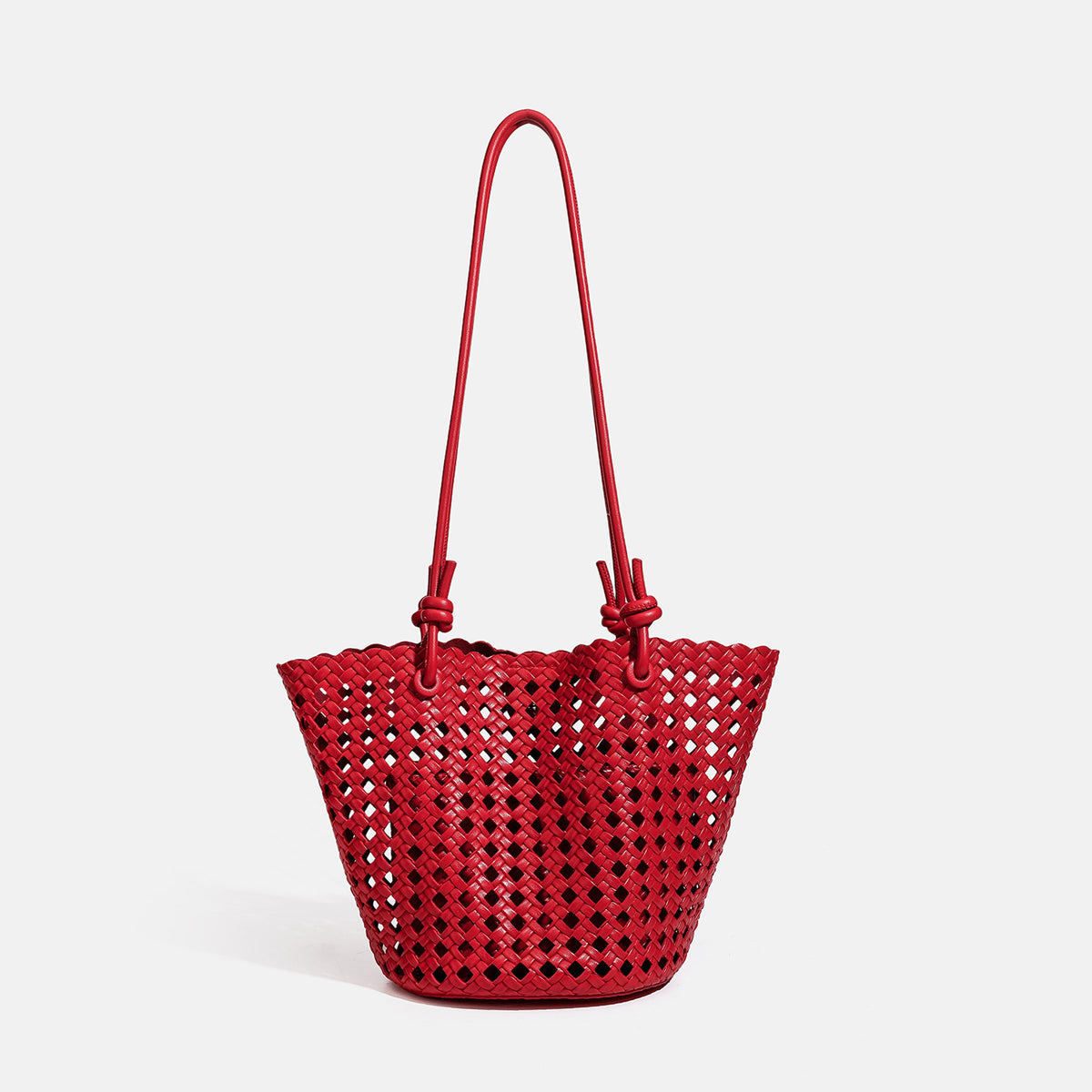 Open-weave lattice bucket tote bag with long knotted cord handles and tapered silhouette, detail view 11