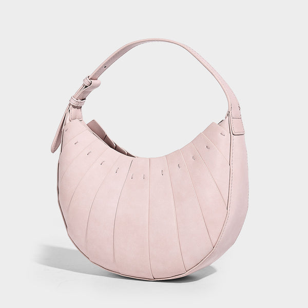Crescent half-moon shoulder bag with vertical panel seaming, matte-satin leather-look finish, and adjustable gold-tone