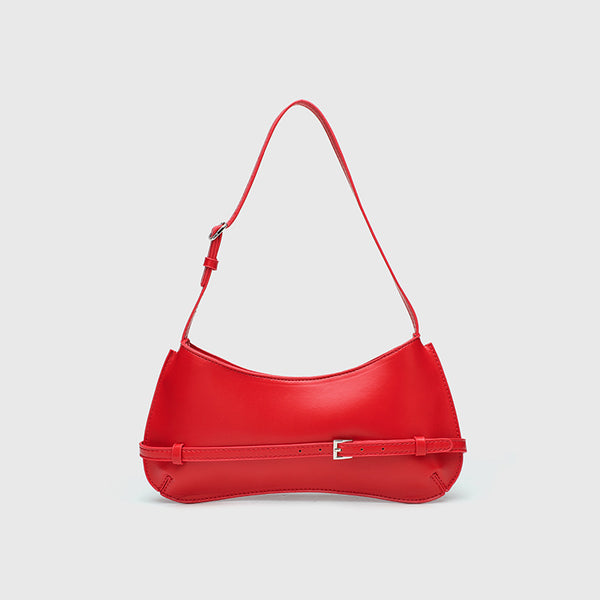 Curved baguette shoulder bag with front buckle strap and adjustable thin strap in glossy leather-look finish, detail view 3