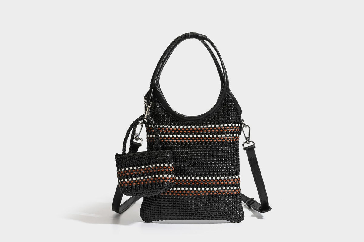 Color-block woven tote bag with rounded leather-look handles, detachable crossbody strap, and matching mini clip-on pouch in
