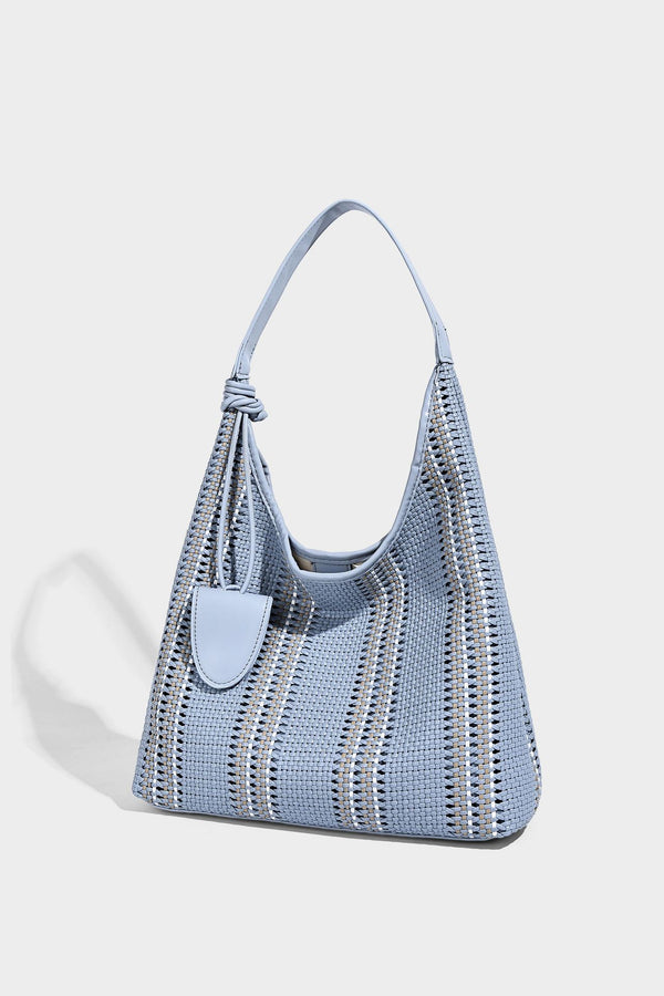 Woven striped slouch shoulder tote bag with knotted strap and attached front flap pouch, detail view 17