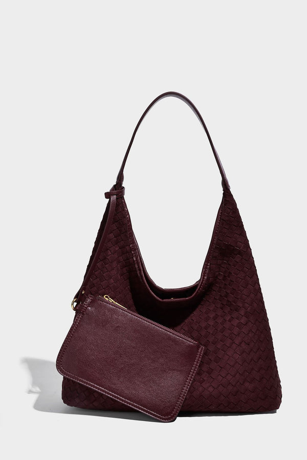 Large slouchy woven hobo tote bag with curved shoulder strap and triangular silhouette, detail view 29