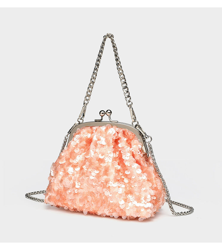 Small structured sequin kiss-lock evening bag with silver-tone chain strap in cream white, detail view 15