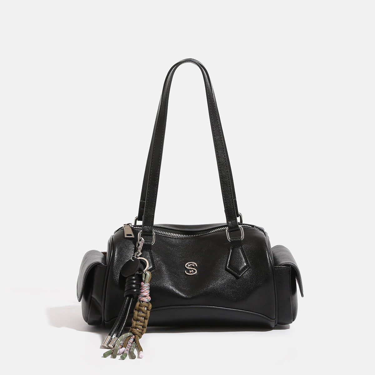 Black glossy leather-look bowling shoulder bag with double straps, silver-tone hardware, side flap pockets, and braided rope