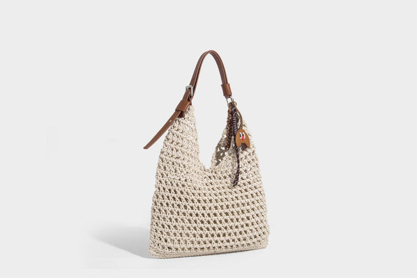 Slouchy open-knit crochet hobo tote bag with leather-look top handle and metal buckle hardware, detail view 15