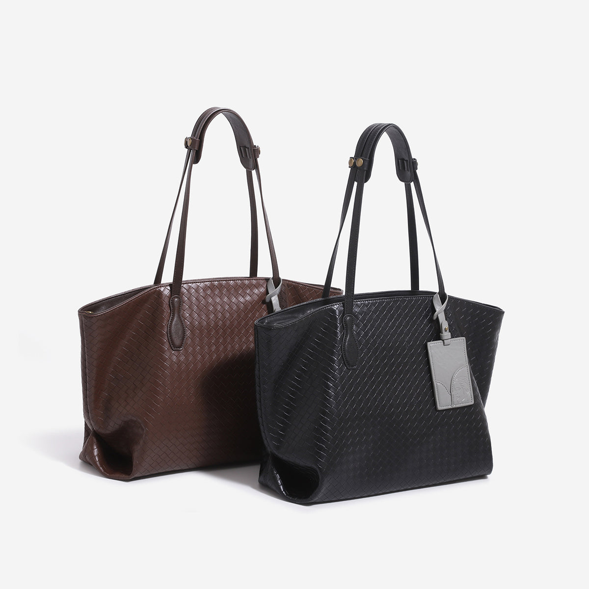 Large woven-embossed leather-look shoulder tote bag with slim double straps and antique gold hardware, detail view 2