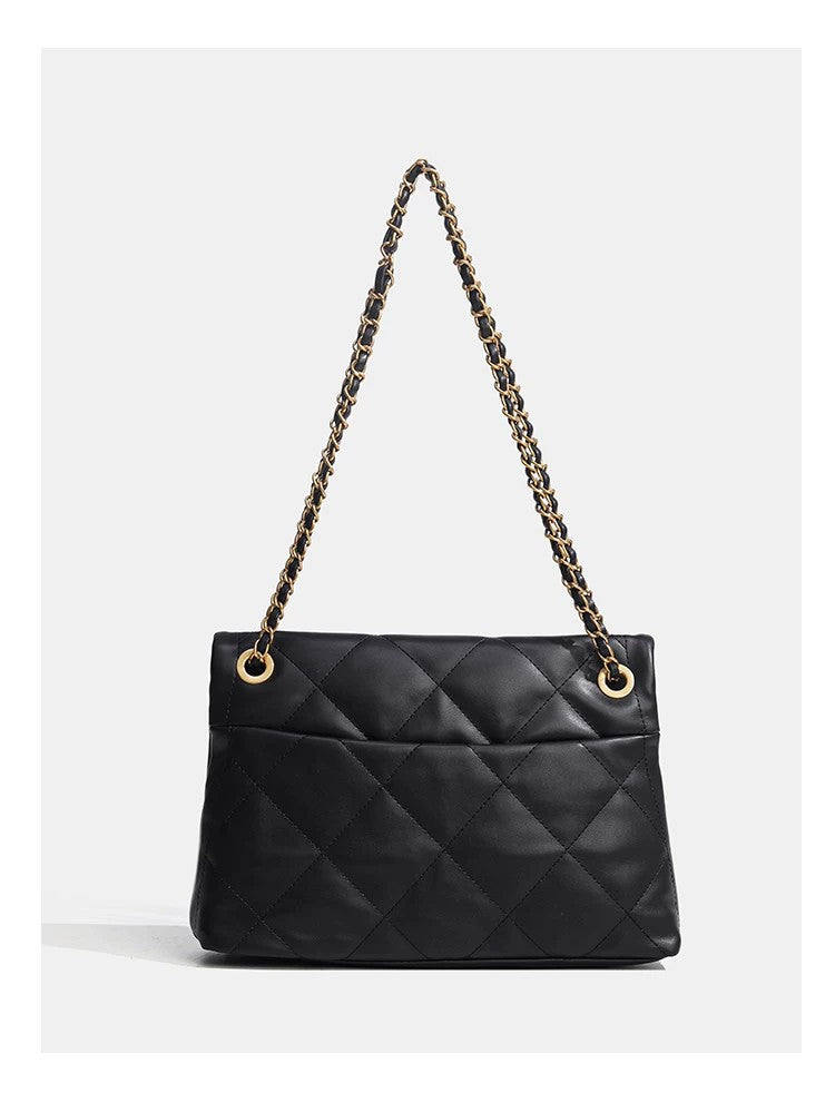 Quilted diamond flap shoulder bag with gold-tone chain strap and twist-lock closure, detail view 15