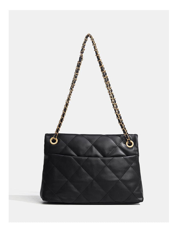 Quilted diamond flap shoulder bag with gold-tone chain strap and twist-lock closure, detail view 15