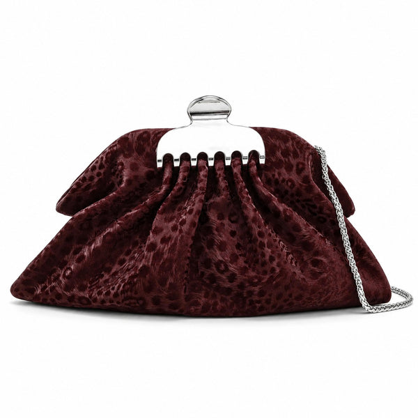 Gathered pouch clutch bag in metallic silver with polished silver-tone frame clasp and fine chain strap, detail view 11