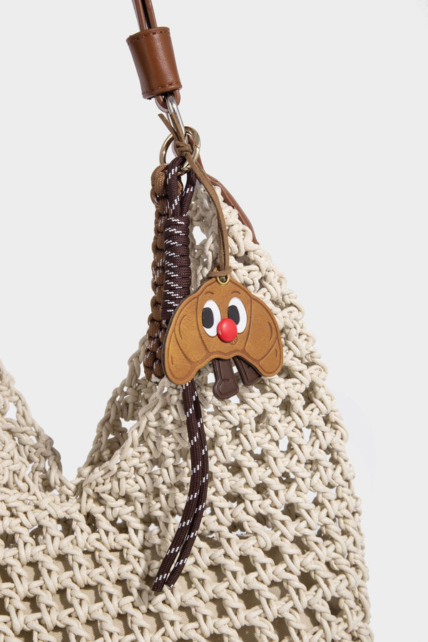 Slouchy open-knit crochet hobo tote bag with leather-look top handle and metal buckle hardware, detail view 14