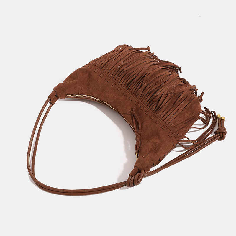 Slouchy fringe hobo shoulder bag in matte suede-like finish with tie-knot cord strap and gold-tone zip closure, detail view 4