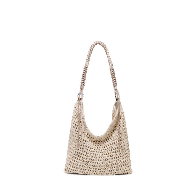 Große gewebte Hobo-Schultertasche in Creme mit geflochtenem Kordelriemen und silberfarbenen Ringdetails, Detailansicht 5