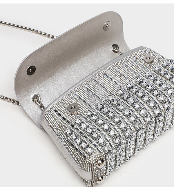 Structured mini flap crossbody bag covered in grid-set rhinestones with silver-tone chain strap, detail view 11