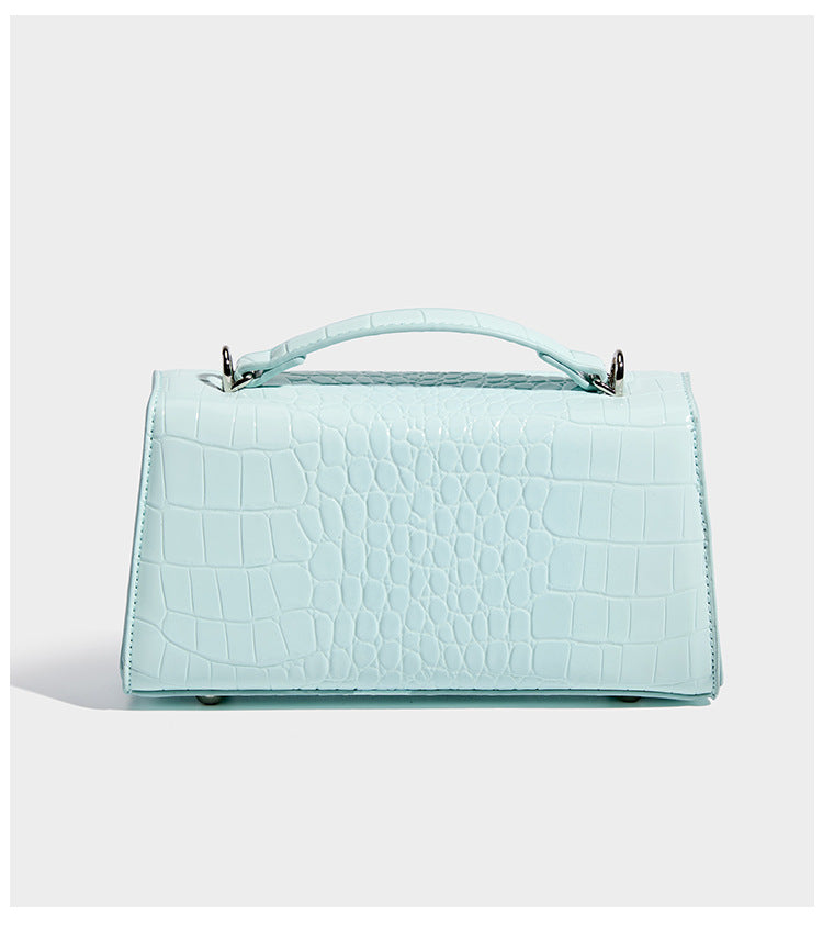 Compact structured flap satchel with glossy crocodile-embossed leather-look finish, silver-tone turn-lock hardware, and