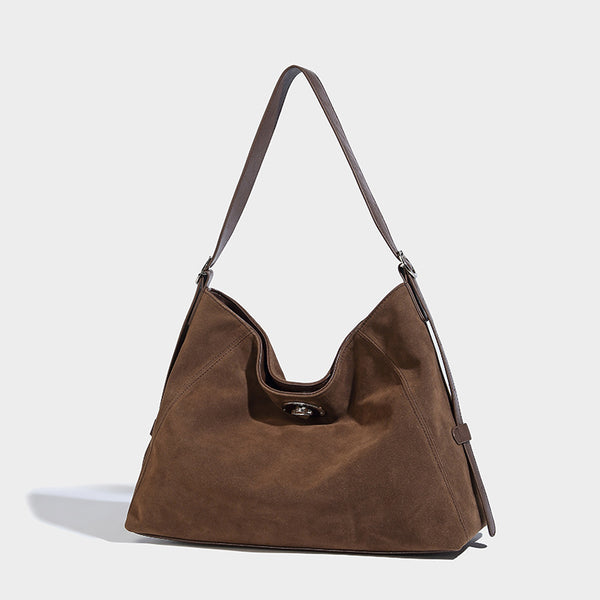Slouchy hobo shoulder bag with turn-lock flap closure and adjustable strap, detail view 18