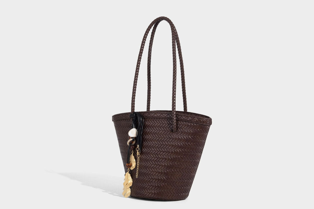 Chevron-woven bucket tote bag with braided shoulder straps and matching drawstring pouch, detail view 23