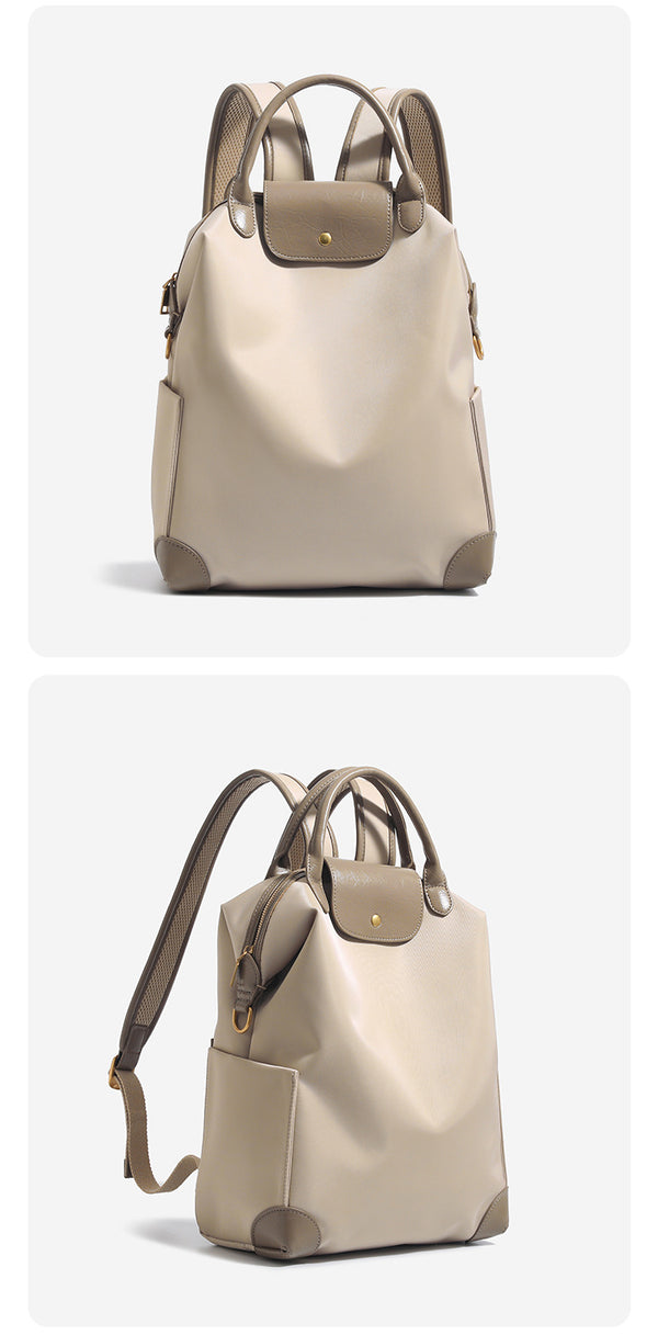 Large matte nylon backpack handbag with cognac leather-look trim, snap flap, and gold-tone hardware, detail view 13