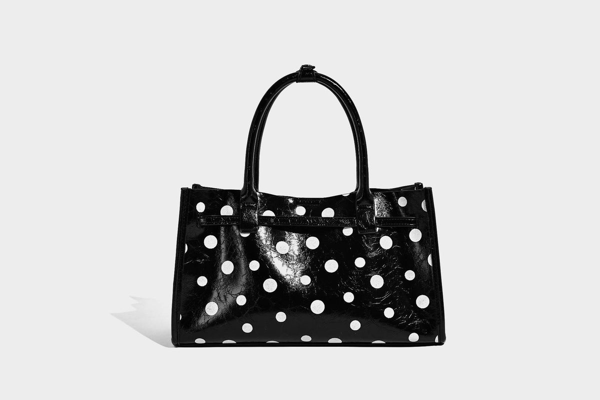Structured glossy leather-look polka-dot satchel tote with dual top handles and detachable shoulder strap, detail view 17