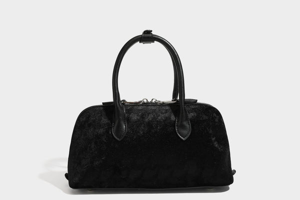 Small structured satchel bag in dark brown velvet-like textured finish with leather-look trim, silver-tone turn-lock bar