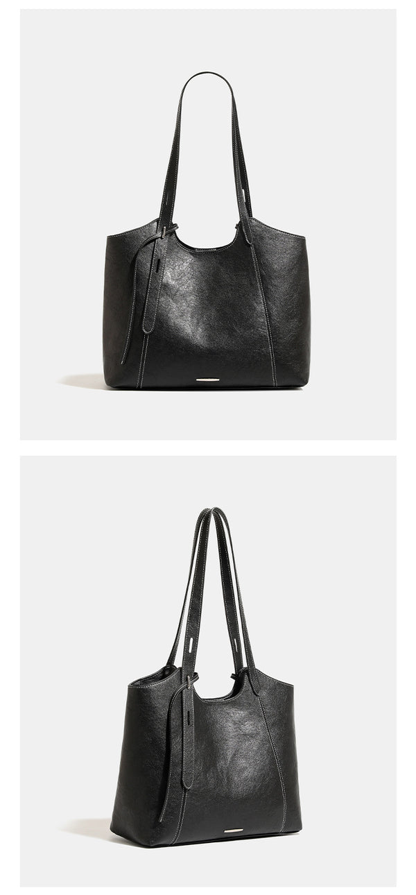 Structured open-top leather-look tote bag with long shoulder straps, contrast stitching, and side tie details, detail view 16