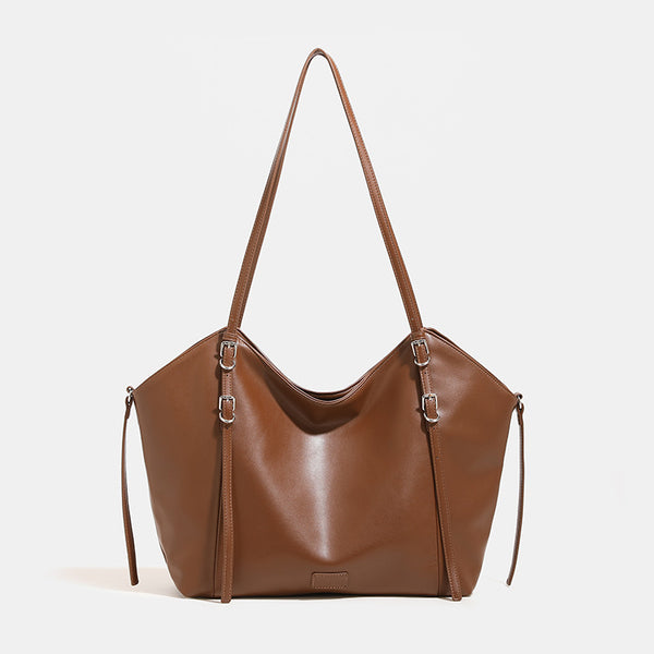 Glatte Tote-Schultertasche aus Lederimitat mit silberfarbenen Schnallenbeschlägen und zwei Schulterriemen, Detailansicht 9