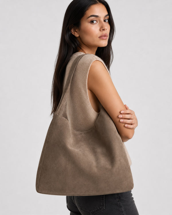 Large slouchy hobo shoulder bag in brushed suede-like finish with single flat strap and unstructured body, detail view 11