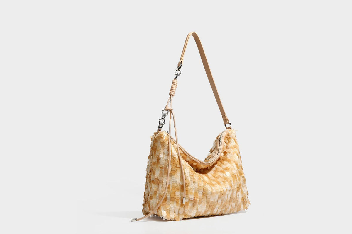 Slouchy paillette sequin hobo shoulder bag with zip closure and adjustable leather-look strap with silver chain hardware