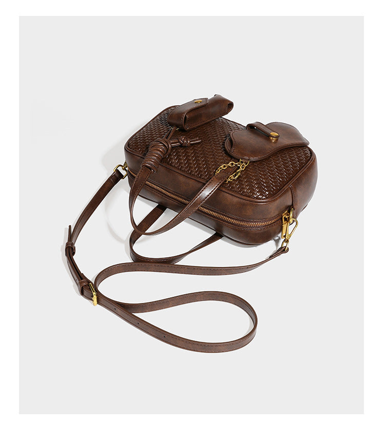 Strukturierte rechteckige Satchel-Tasche mit gewebtem Vorderteil in Lederoptik, goldfarbenen Details, zwei Tragegriffen und abnehmbarem