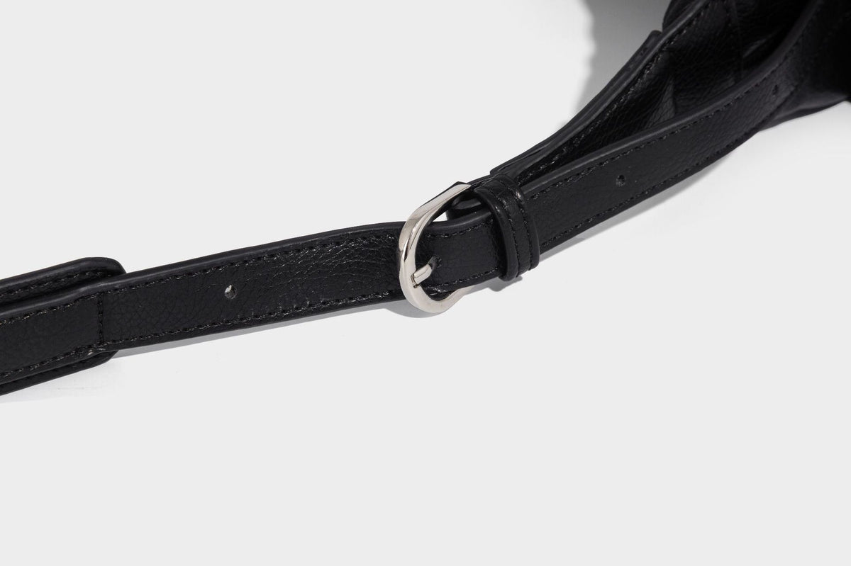 Soft pebbled leather-look hobo shoulder bag with zip top closure, side flap pockets, and silver-tone hardware, detail view 22