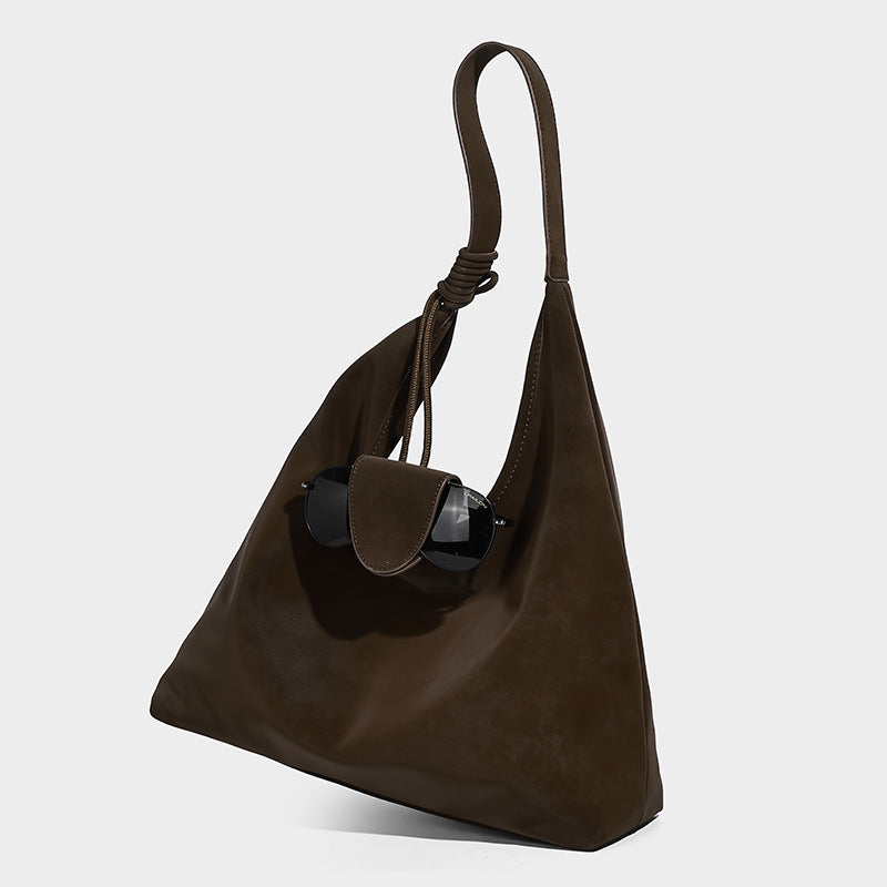 Slouchy oversized matte suede-look shoulder tote bag with knotted strap and attached front flap pouch, detail view 6
