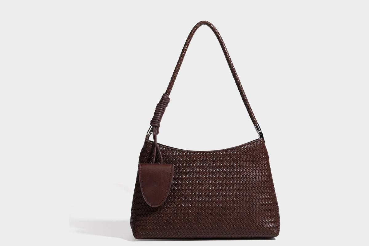 Woven-texture hobo shoulder bag in brown with braided top handle, adjustable crossbody strap, front flap pocket, and, detail