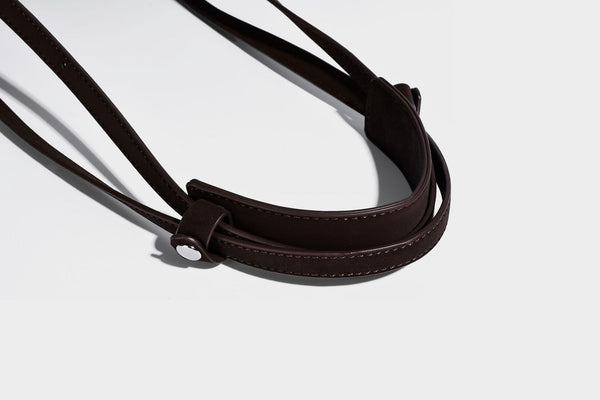 Structured rectangular matte suede-like shoulder bag with silver-tone hardware, zip closure, double top handles, and, detail