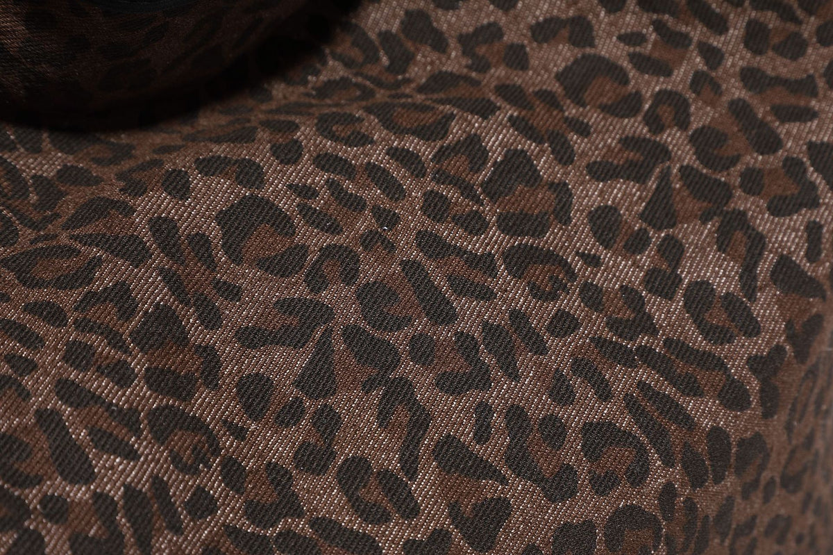 Slouchy brown leopard jacquard hobo tote bag with black leather-look trim and single shoulder strap, shown with black, detail