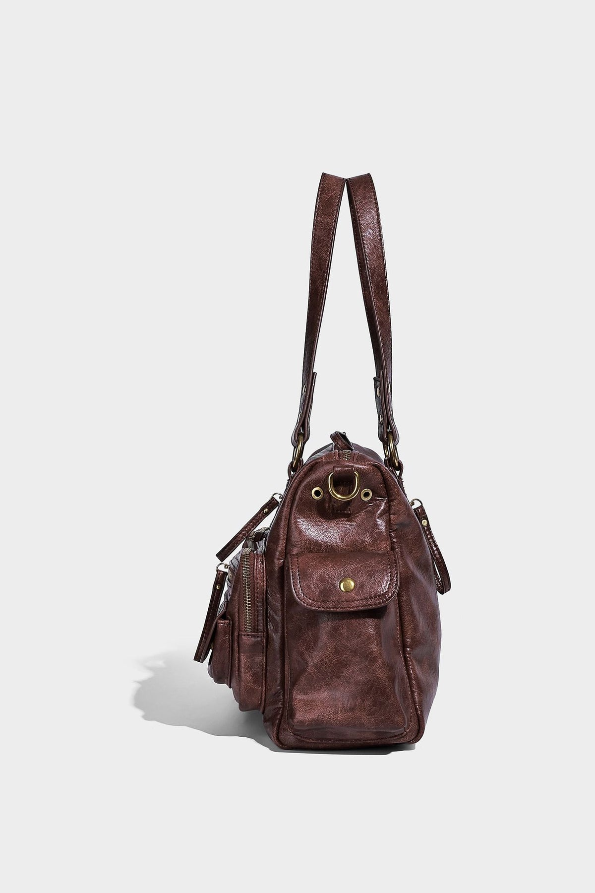 Distressed leather-look vintage satchel shoulder bag with multiple front zip pockets, dual top handles, and brass-tone