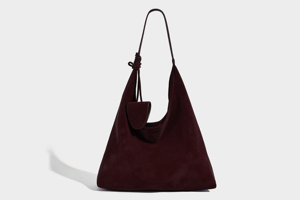 Slouchy oversized matte suede-look shoulder tote bag with knotted strap and attached front flap pouch, detail view 10