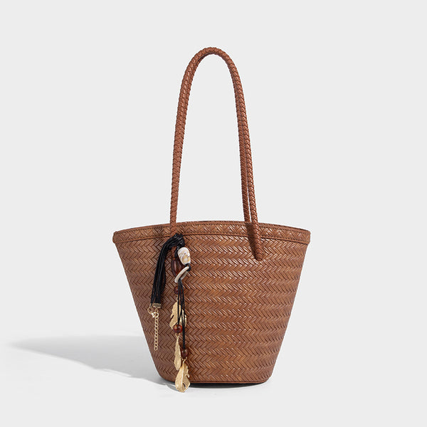 Chevron-woven bucket tote bag with braided shoulder straps and matching drawstring pouch, detail view 8