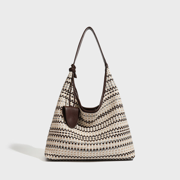 Slouchy woven stripe hobo shoulder bag with black-and-white pattern and leather-look strap, detail view 3