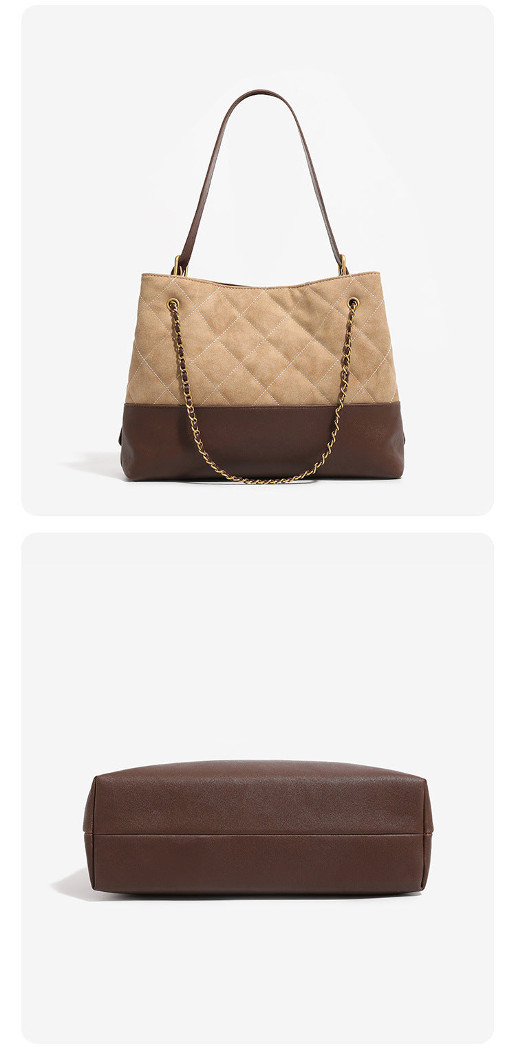 Two-tone tan quilted and dark brown leather-look tote bag with gold chain strap and floral knot emblem, detail view 9
