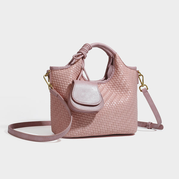 Woven leather-look tote bag in mocha brown with knotted top handle, front flap pocket, and detachable crossbody strap with