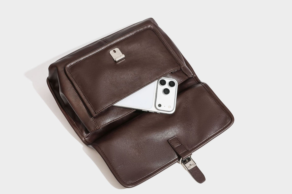 Structured rectangular satchel bag in dark espresso brown with smooth leather-look finish, flap front with silver turn-lock