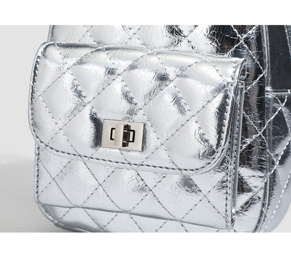 Quilted leather-look backpack purse with chain strap and turn-lock front pocket, detail view 13